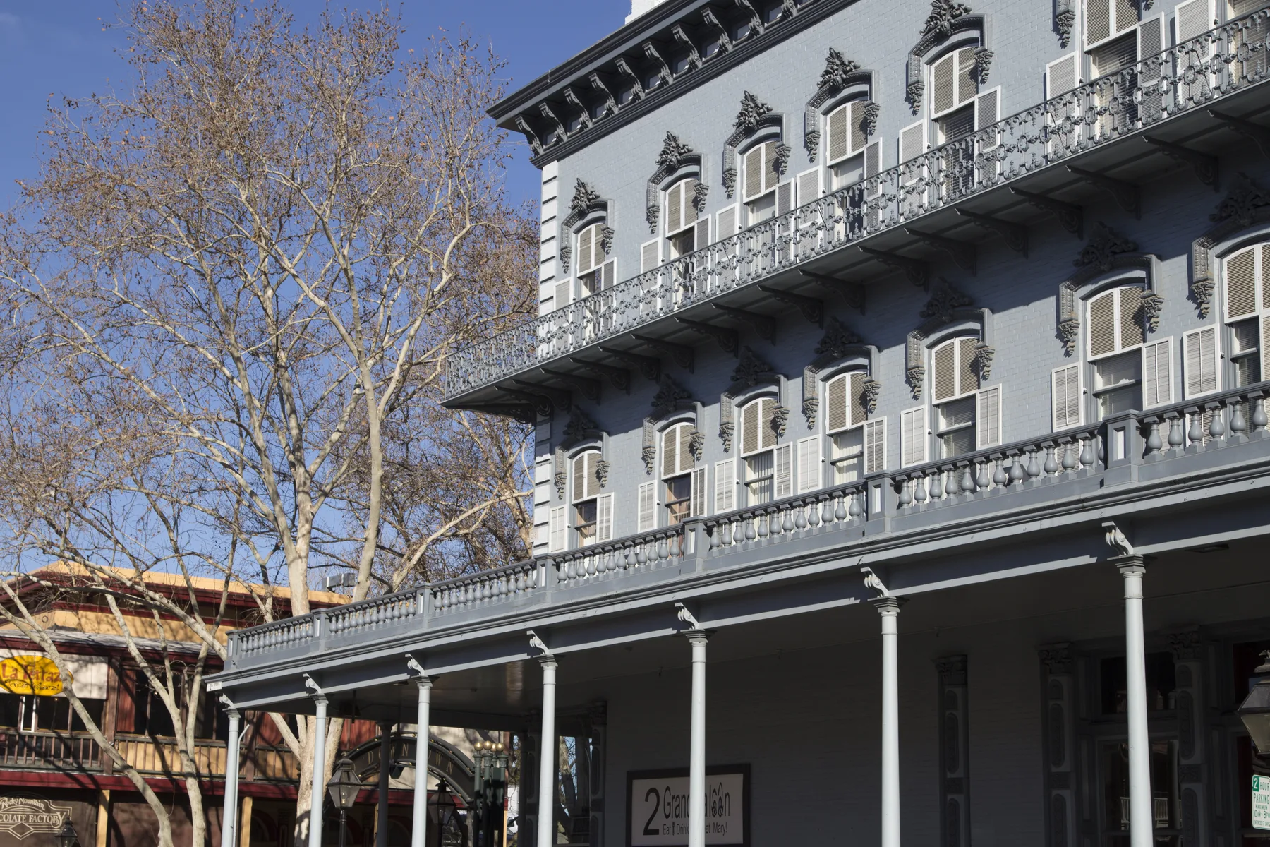 Ornate balconies and shuttered windows in Old Sacramento